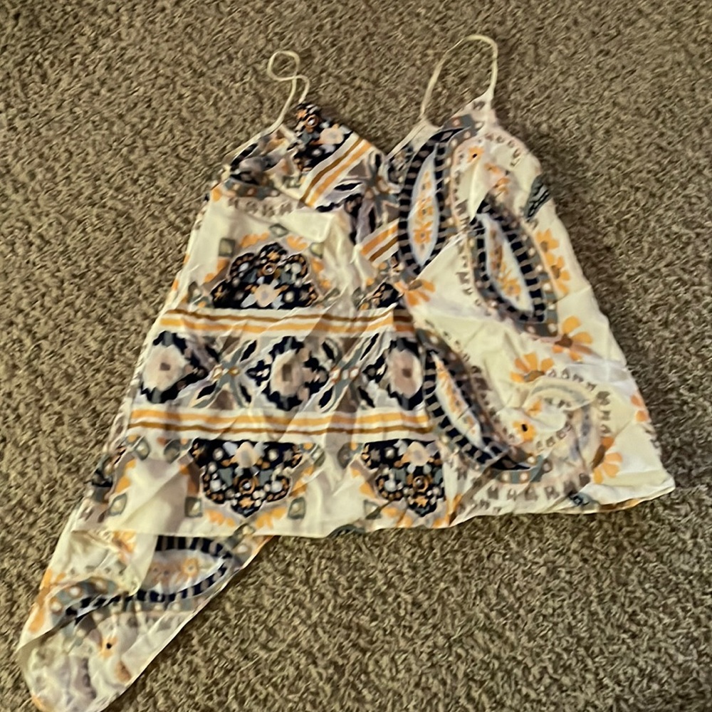HD in Paris size 8 asymmetrical sleeveless blouse
